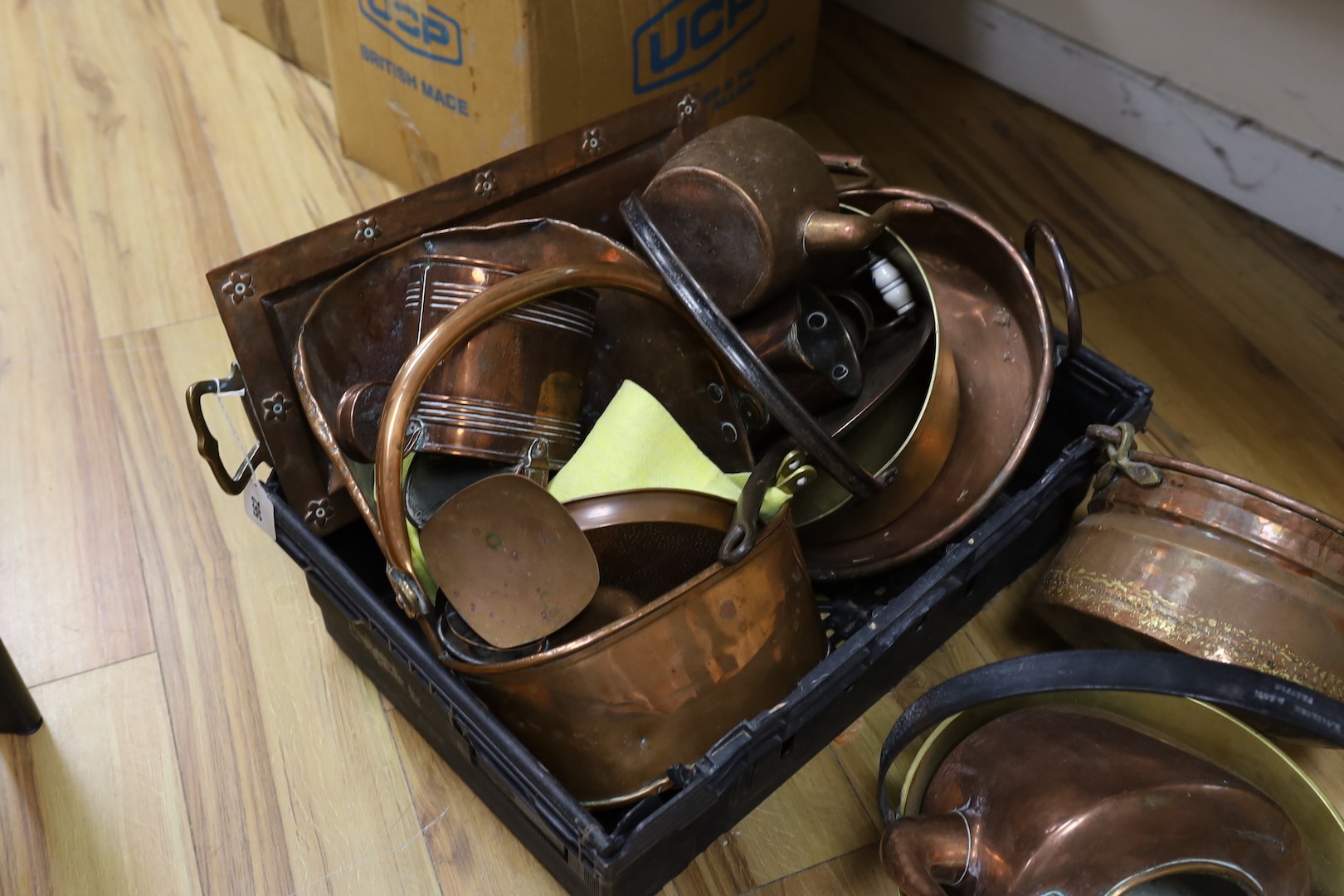 Mixed copper kettles, brass pot, a copper scuttle etc.